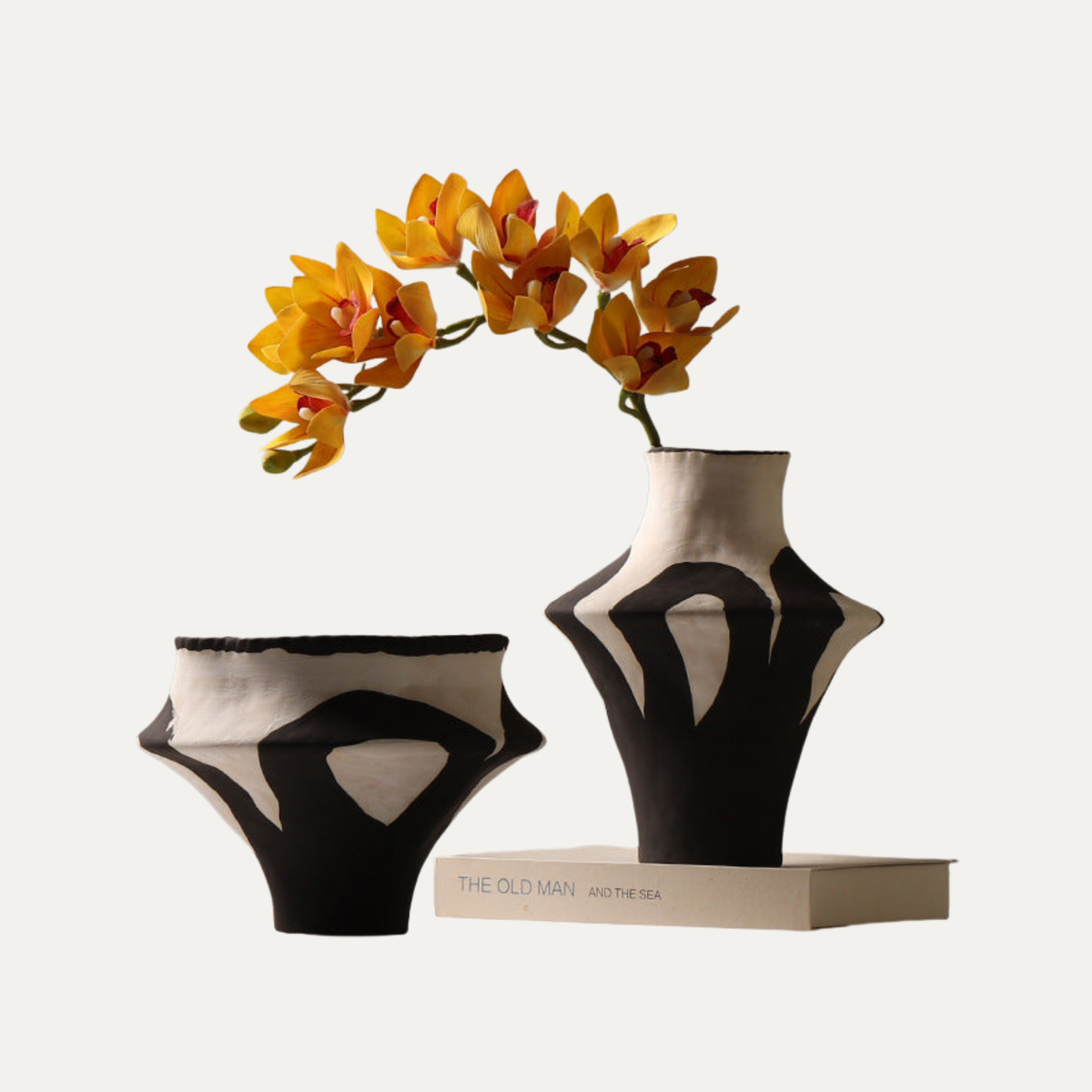 Noir Sculptural Ceramic Vase in two sizes on a plain background