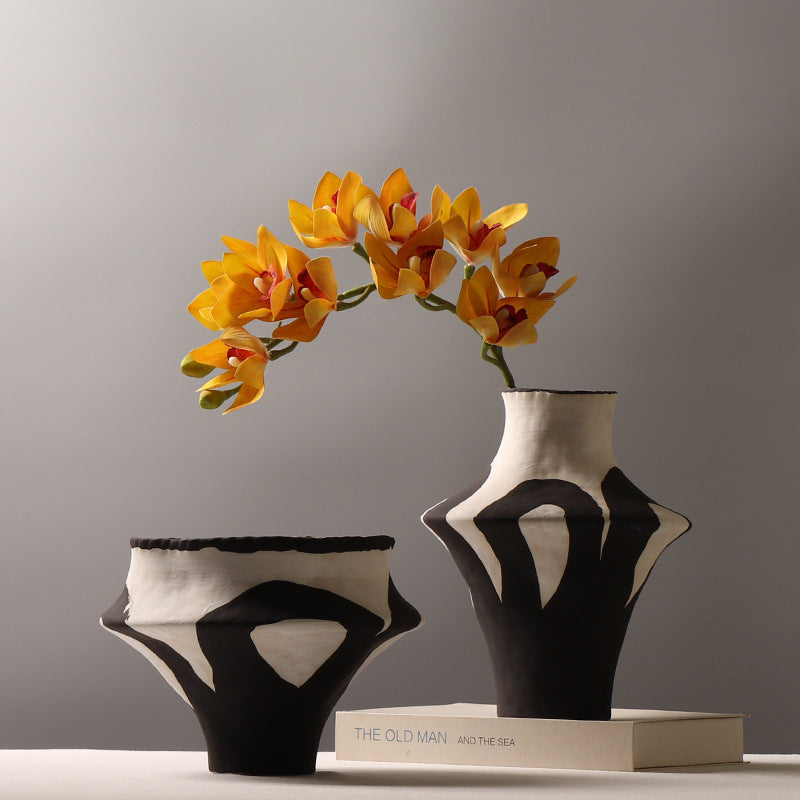 Noir sculptural ceramic vases in black and cream