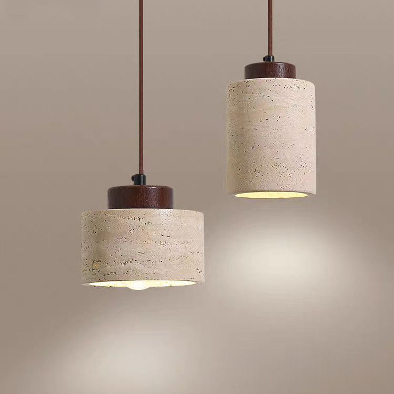 Two travertine pendant lights with wood details